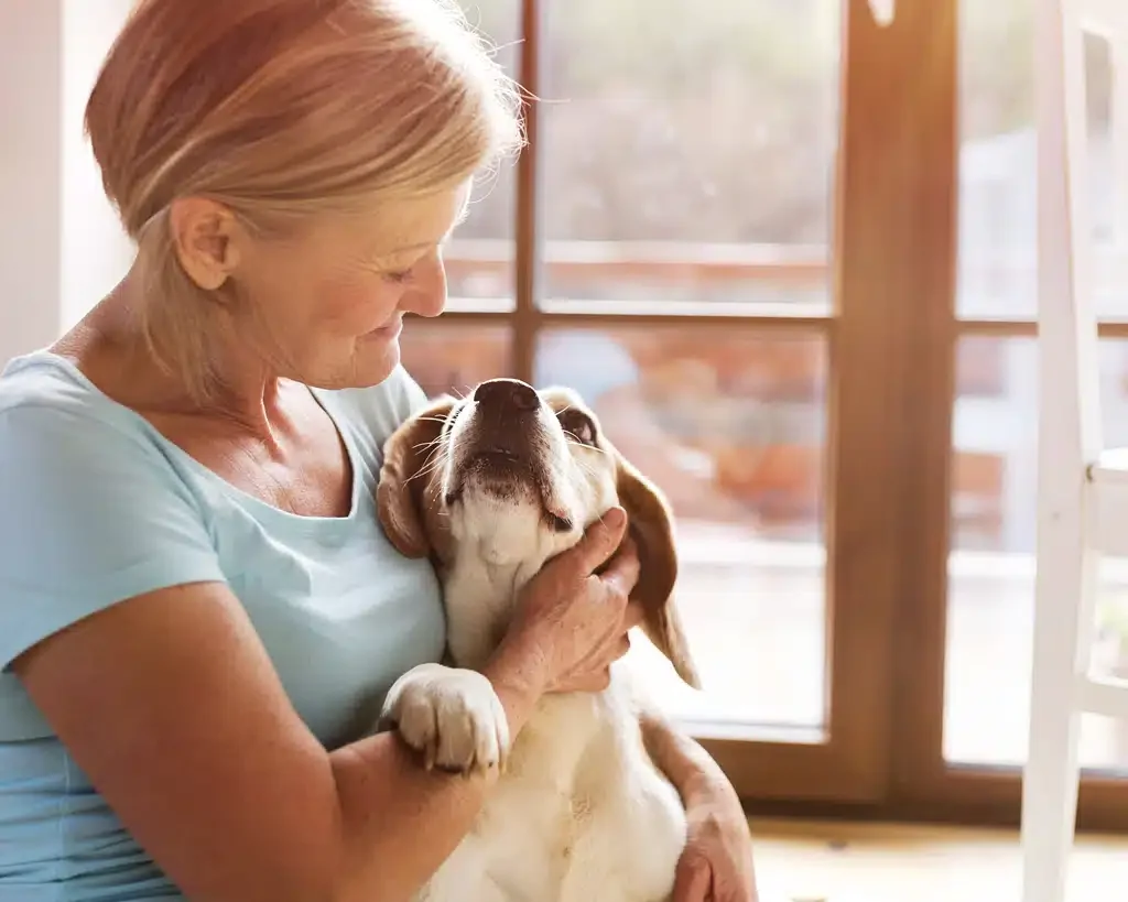 woman with her senior dog